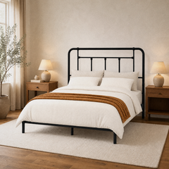 Room 1 angle | Three-quarter bedroom view showing the rounded outer posts and open center bars
