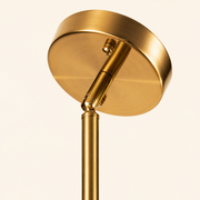 Closer | brushed gold brass finish on the rod and ceiling canopy