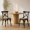 In a room | the pair in a warm oak dining room, soft morning sidelight from the left window