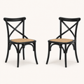Studio | both chairs at a true three-quarter angle, seat depth and the cross-back both reading