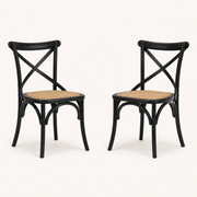 Studio | both chairs at a true three-quarter angle, seat depth and the cross-back both reading