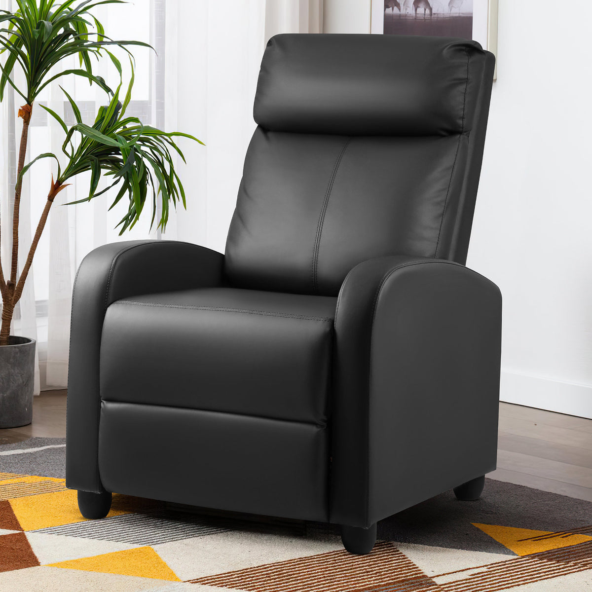 Manual Push-Back Recliner in Black Faux Leather with Rubber Legs
