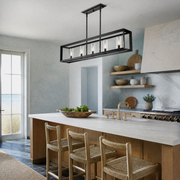 Room 3 | Matte black five-light linear chandelier above a light stone kitchen island