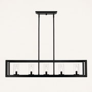 Studio front | Front view of the matte black rectangular cage with five clear glass shades