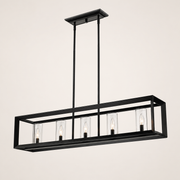 Studio three-quarter | Angled view of the matte black rectangular cage and five clear glass shades