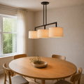 Angle | closer view across the table toward the lit pendant