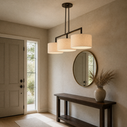 Entry | the same pendant hung lengthwise above an entryway console table