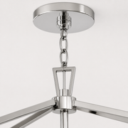 Hardware | close view of polished chrome round canopy, chain links, and top suspension joint