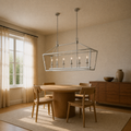 Angle | polished chrome 6-light linear chandelier from a second corner angle in a warm ivory dining room