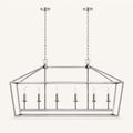 Front | polished chrome 6-light linear chandelier with two chains, round canopies, and six candle bulbs on a clean background