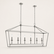 Studio | polished chrome 6-light linear chandelier from a low three-quarter studio angle showing cage depth and six candle bulbs