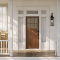 In scale | Antique bronze wall lantern beside a full-height entry door
