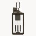 Front | Antique bronze aluminum wall lantern with oval loop, clear beveled glass, and three candle sockets