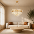 In a room | gold crystal chandelier over a living room coffee table