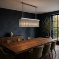 In a room | marnau Baluden 8-Light Crystal Pendant over a walnut dining table