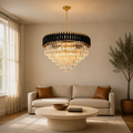 In a room | black and gold crystal chandelier over a living room coffee table