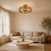 Living room | natural rope drum flush mount above a round coffee table