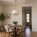 Scale | off-white linen-blend drum chandelier beside an uncropped full-height doorway