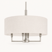 Studio | front view of the off-white linen-blend drum, brushed nickel arms, rigid downrod, and canopy