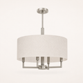 Studio | low rear-side profile of the off-white linen drum, round canopy, rigid downrod, and brushed nickel arms