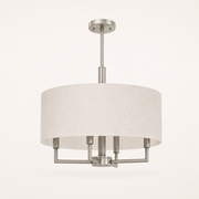 Studio | low rear-side profile of the off-white linen drum, round canopy, rigid downrod, and brushed nickel arms