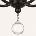 Detail | clear faceted crystal drop with dark bronze finial and bead chain