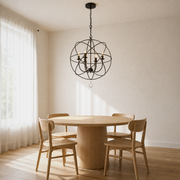 Dining room | English Bronze six-light globe chandelier over a pale oak table