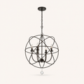 Front | English Bronze open globe chandelier with six clear flame bulbs and a crystal drop