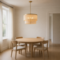 Room | Cigogne satin brass two-tier drum chandelier above a dining table