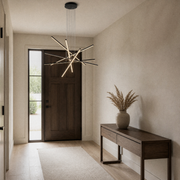 In an entryway | matte black six-bar integrated LED chandelier beside a tall sidelight