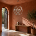 Entry | Brushed nickel four-light globe chandelier in a terracotta plaster entry