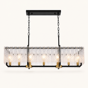 Front | seven brass sockets and clear rippled glass slats on a matte-black rectangular pendant