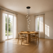 Scale | the pendant cluster beside a floor-to-ceiling doorway for true size