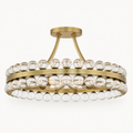 Studio front | antique brass ring with clear crystal spheres, round canopy, and curved mounting rods