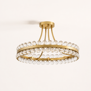 Underside profile | antique brass canopy, curved mounting rods, lower ring, sockets, and crystal spheres