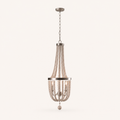 Side | side profile of the weathered white wood-bead chandelier showing its chain, bead bowl and finial