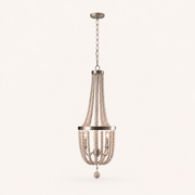 Side | side profile of the weathered white wood-bead chandelier showing its chain, bead bowl and finial
