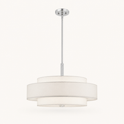Studio front | full off-white three-drum linen-blend chandelier with chrome-tone rod and canopy