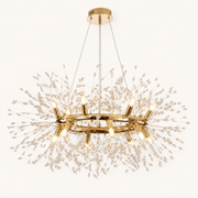 Front | warm gold-tone 12-light crystal ring chandelier on a clean studio background
