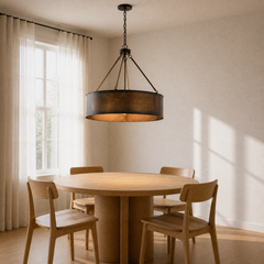 Angle | the same drum chandelier from three quarters in the dining room