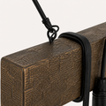 Hardware close-up | black suspension cable eyelet, beam strap, and cord socket