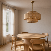 Room 1 angle | second view of honey-tan three-tier rope chandelier over round oak dining table