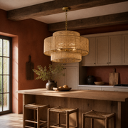 Room 3 | honey-tan three-tier rope chandelier over a natural-oak kitchen island beneath dark beams