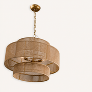 Studio side | lower profile view of three honey-tan rope tiers, gold frame, canopy and chain