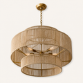 Studio angle | underside of the three cascading honey-tan rope tiers with gold spoke bracing and lit sockets