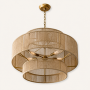 Studio angle | underside of the three cascading honey-tan rope tiers with gold spoke bracing and lit sockets