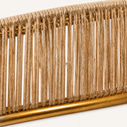 Texture | close view of honey-tan handwoven rope cords and distressed gold trim