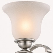 Glass texture | close view of the frosted white glass shade texture, brushed nickel cup and curved arm