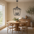 In a room | marnau Lampaul 4-Light Lantern Chandelier over a pale-oak dining table