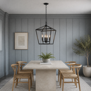 In a room | marnau Lampaul 4-Light Lantern Chandelier in a blue-gray sunroom dining room